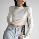 padded shoulder mock neck cropped top